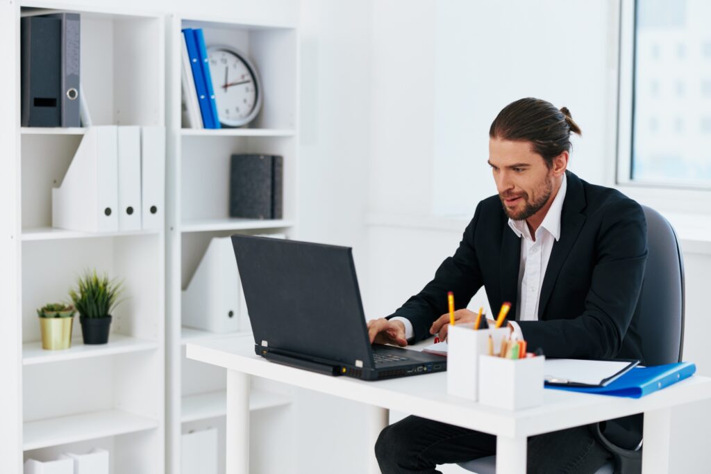 manager laptop desktop office technology